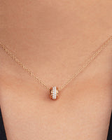 POSSESSION MINI RING TURNING PENDANT