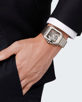SANTOS DE CARTIER, SKELETON, LARGE, MANUAL, STEEL, INTERCHANGEABLE STEEL AND LEATHER BRACELETS